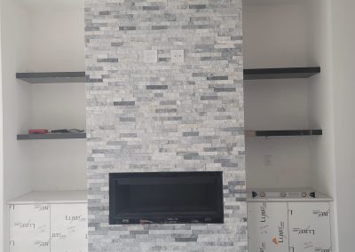 Natural stone fireplace installation